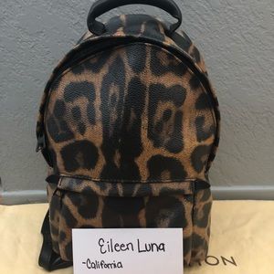 LE LV Palm Springs PM leopard backpack.